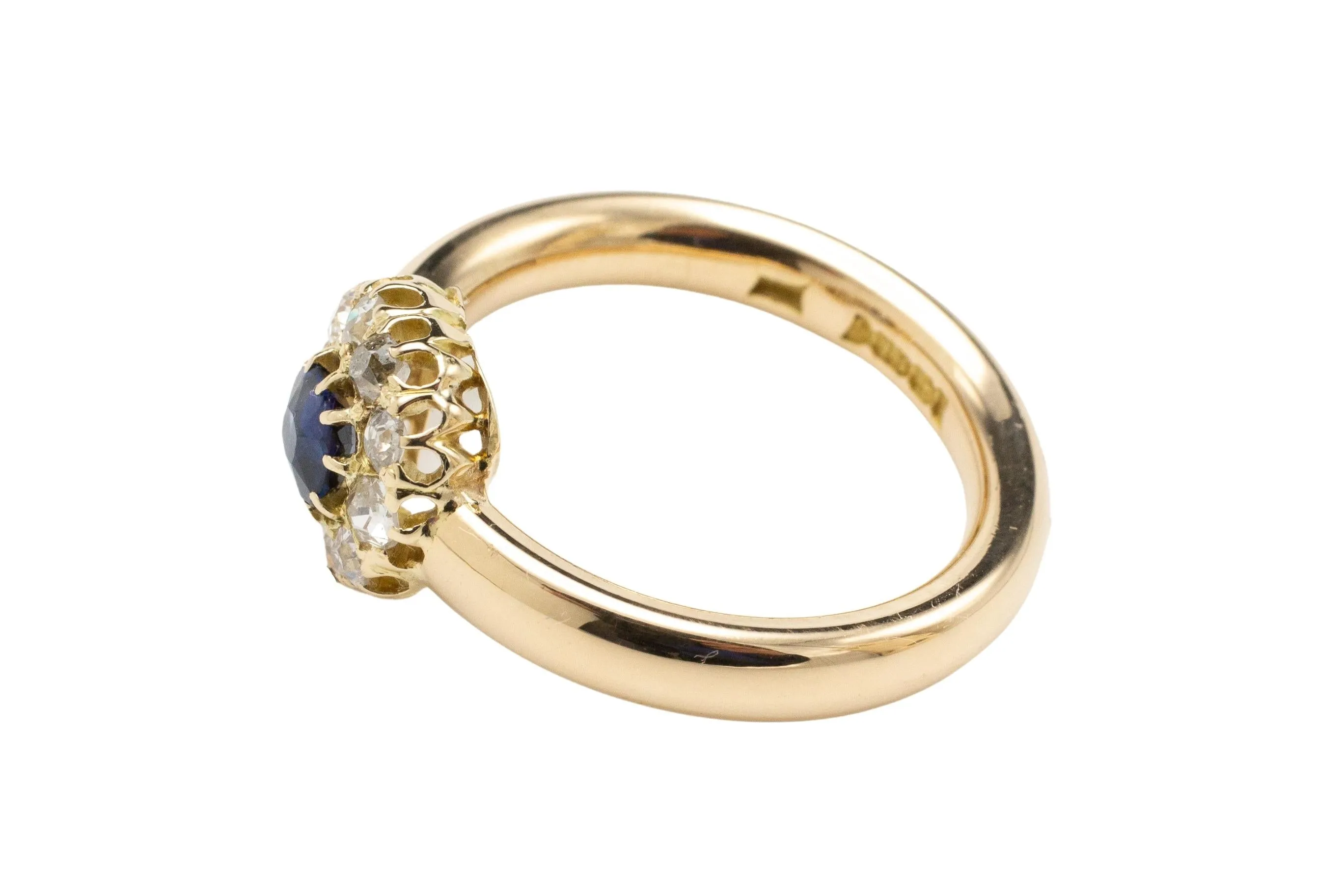 18 carat gold sapphire and diamond cluster ring